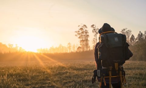 Hiker looking at the sunset